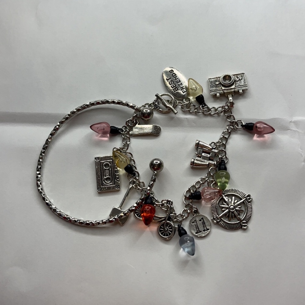 CHARM BRACELET AND SILVER BRACELET STACK 📸
